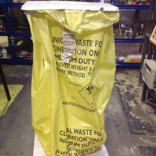 white metal medical waste bin with bag