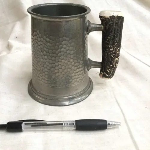 Metal tankard with bone handle