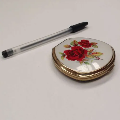 powder compact with rose design