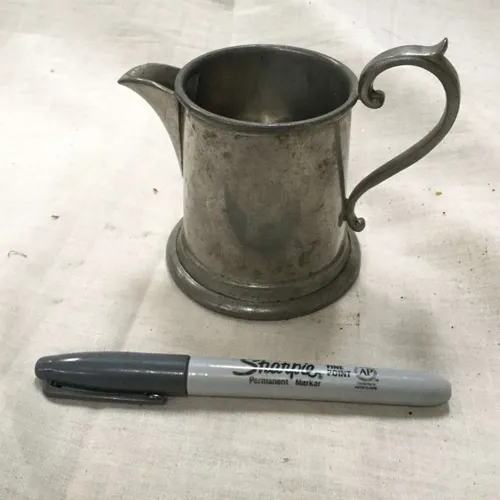 Small silver metal jug 