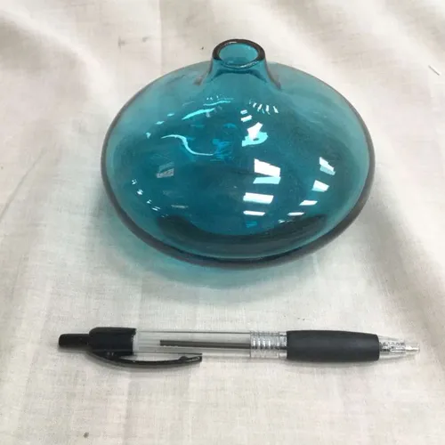 Short wide blue glass vase