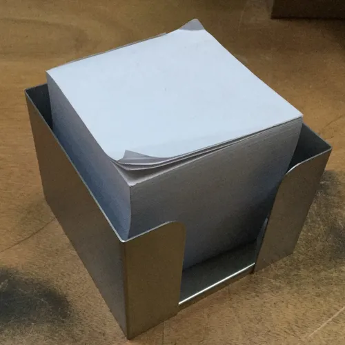 Metal notepaper holder and paper