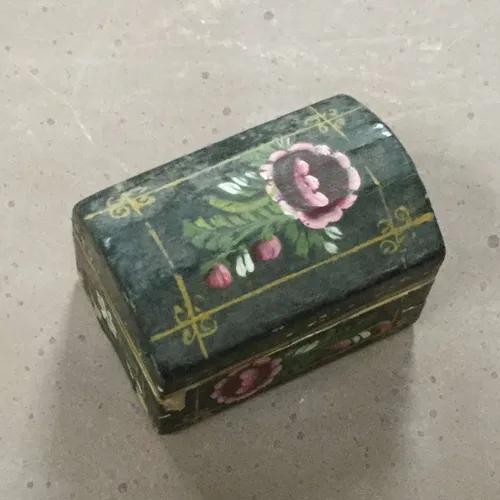 Small black trinket box with flower design