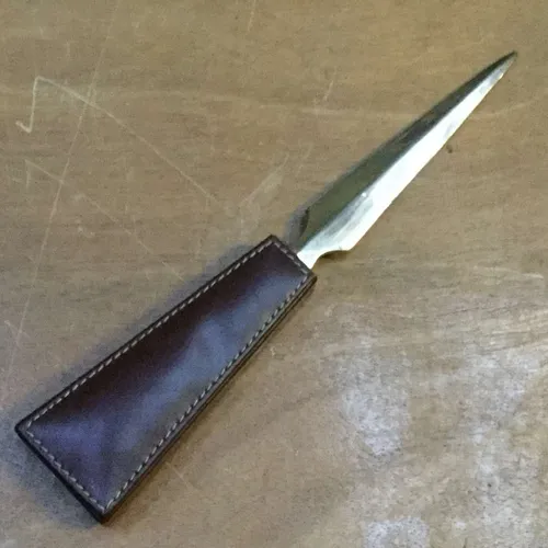 Brown leather letter opener