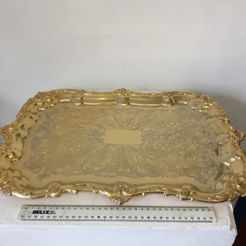 Ornate metal serving tray gold