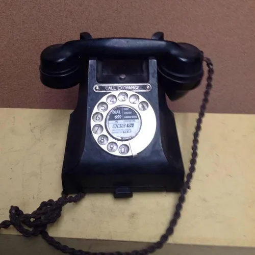 black GPO corded rotary dial black telephone with flex cord