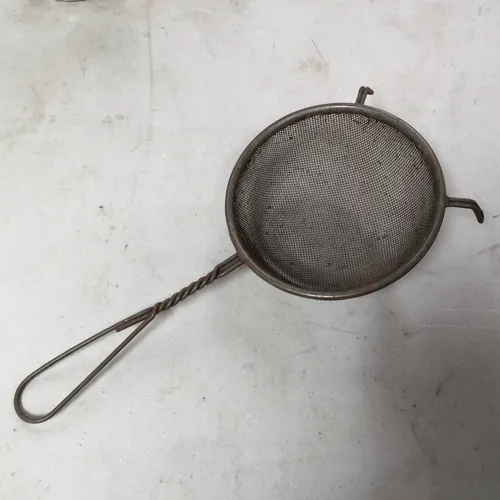 Various vintage sieves
