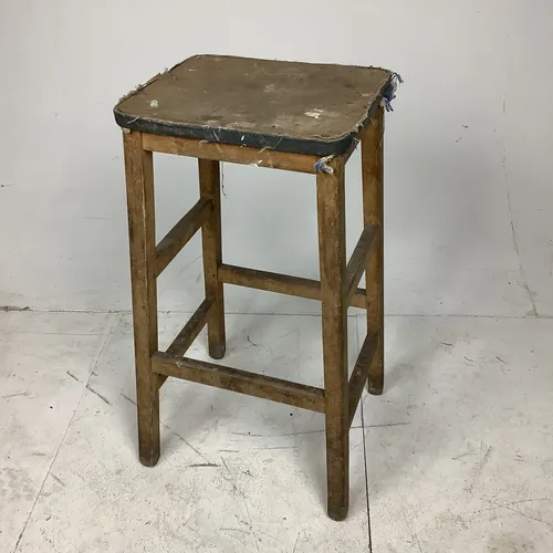 Old worn wooden stool (no seat-pad) 