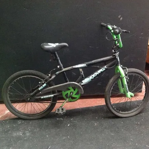black and green BMX bicycle