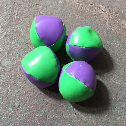 Set of Green and Purple Juggling Balls