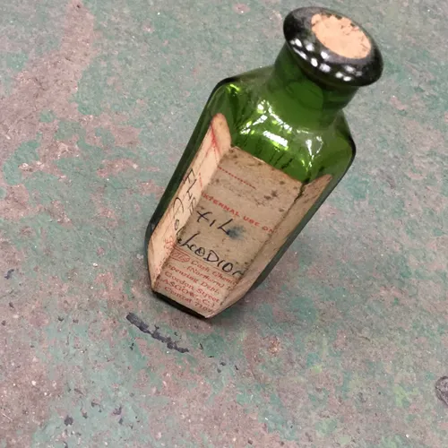 Small Period Green Glass Labelled Medicine Bottle with Cork