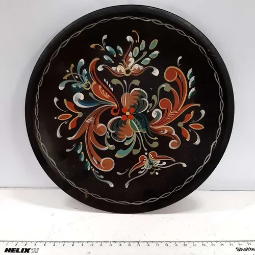 Hanging decorative painted wooden plate with colourful design