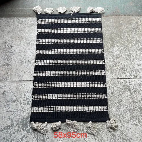 Black and White Floor Mat with White Tassels