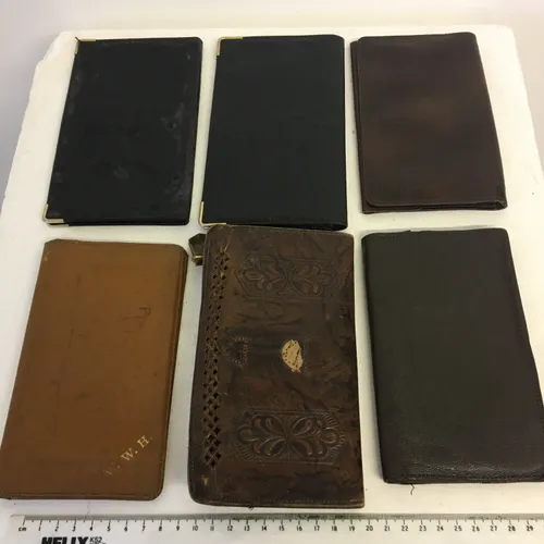 Period long brown leather wallet