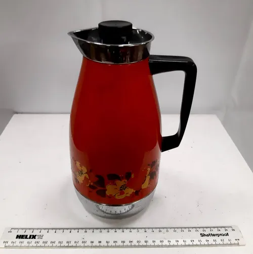 1970s coffee pot Orange with flower design border