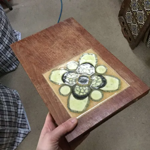 Wooden chopping board with ceramic tile detail