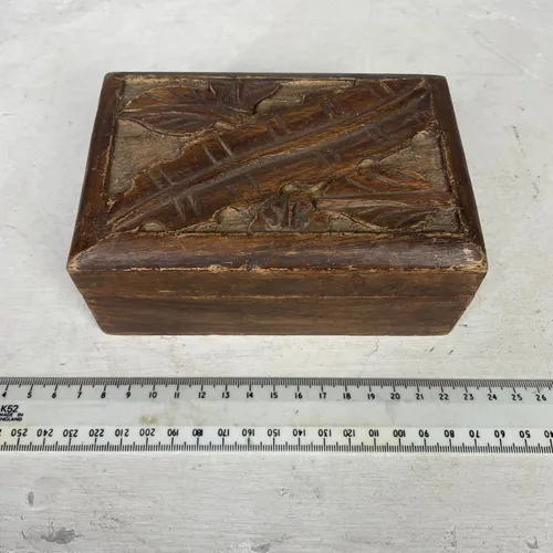 Small wood trinket box with carved leaf design