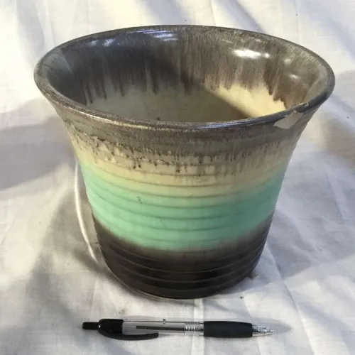 Black, mint green and grey ridged plant pot