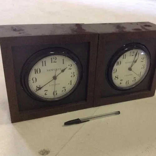 double Newgate plastic analogue clocks in wooden frame