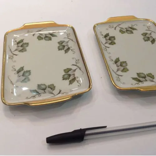 rectangle ceramic dish with green leaf design and gold trim