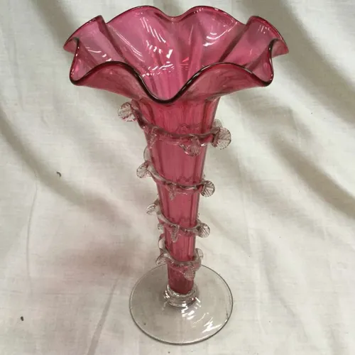 Pink trumpet style glass vase with scalloped edge