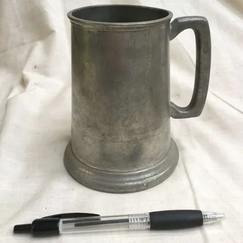 Tall metal tankard 
