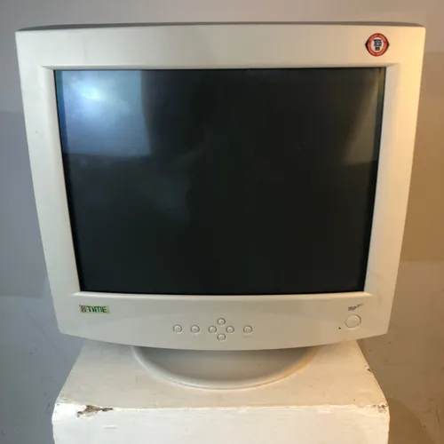 Beige computer monitor 'Time'
