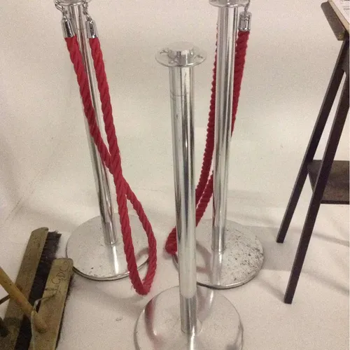 Crowd partition poles and rope barrier set with four chrome poles and two red ropes