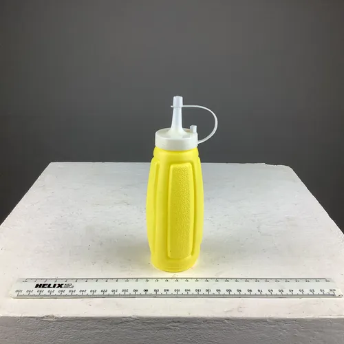 yellow plastic sauce bottle