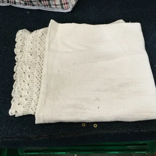 Cream table cloth with decorative lace edge