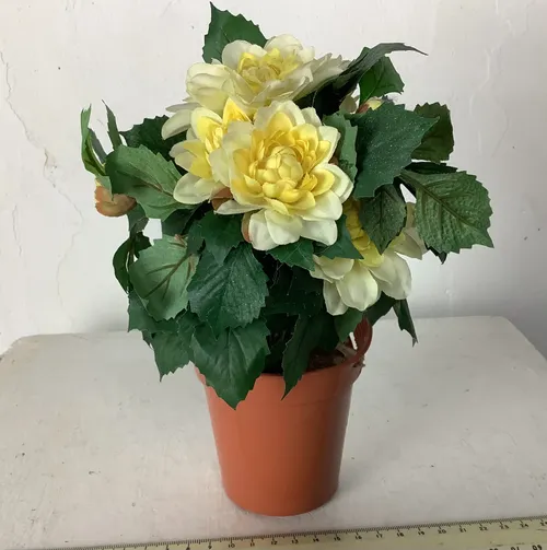Yellow Artificial Flowers in Plant Pot