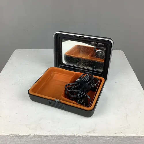 Black Remington Electric Shaver with Case