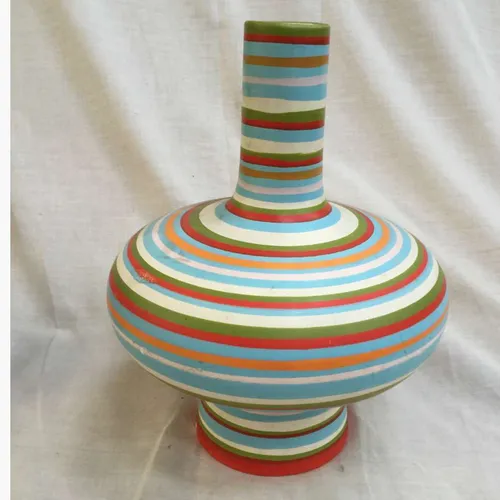 Spinning top like vase with coloured stripes