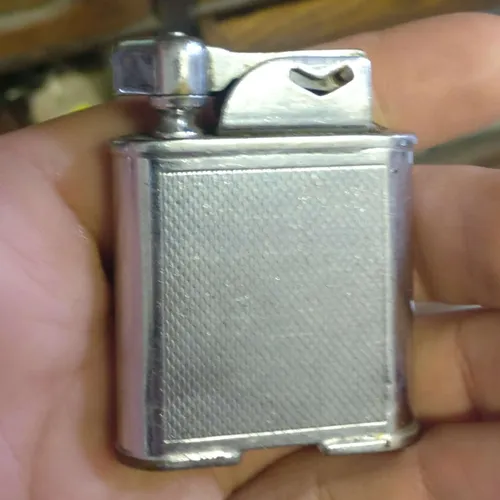 Small silver metal lighter