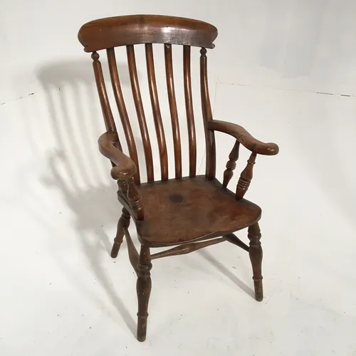 Wood Windsor arm chair