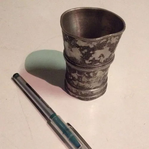 well-worn pewter cup 1