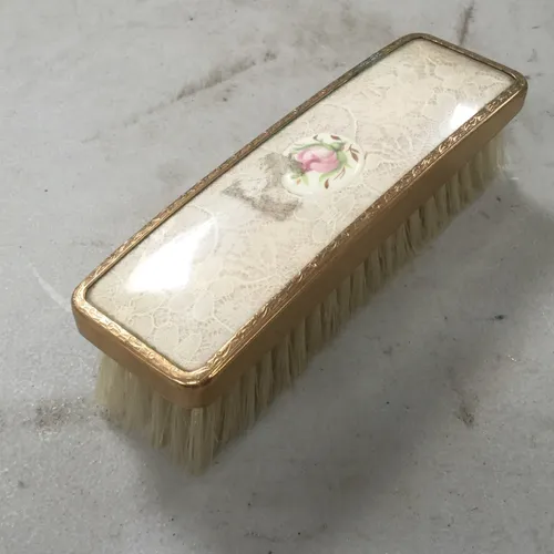 Rectangular hair brush with rose detail design 