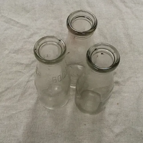 Glass milk bottles