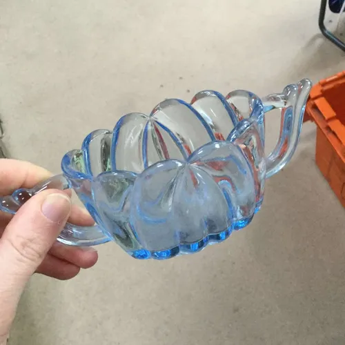 Small blue glass dish with handles