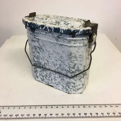 Green and white paint splattered Gamelle metal tin with handle