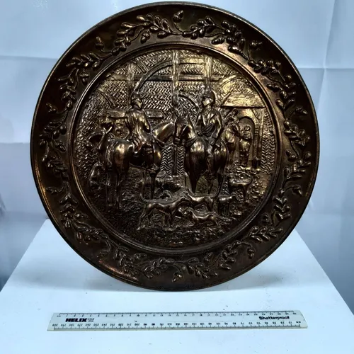 Large brass decorative hanging plate with hunting scene design (38.5cm)