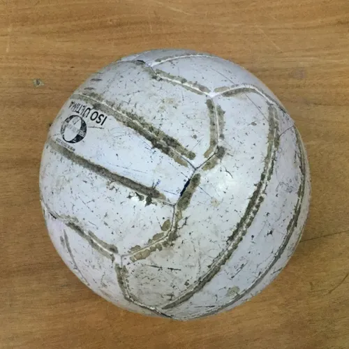 White worn football