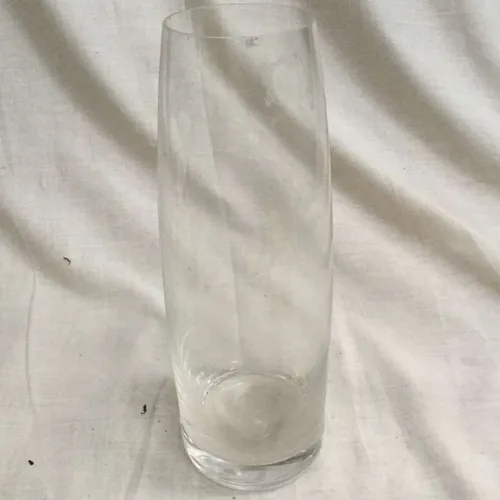 Tall curved glass vase 