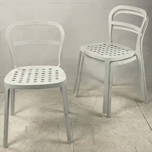 White metal stacking chair