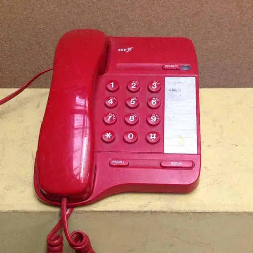 red BT Converse 100 corded push button telephone