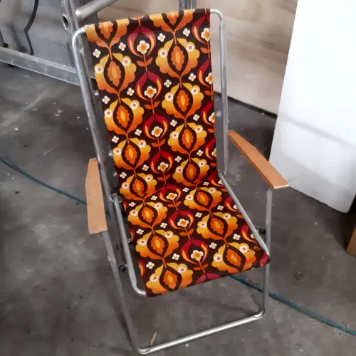 Brown and orange folding beach/deck chair