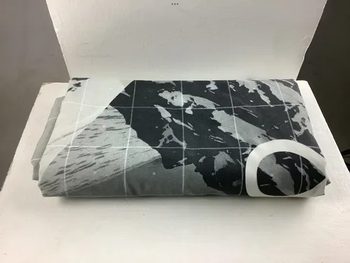 Grey white and black patterned fabric 