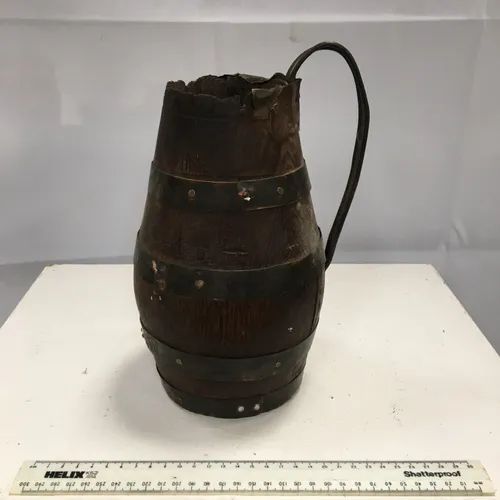 Medieval tankard, wood with metal bands and handle