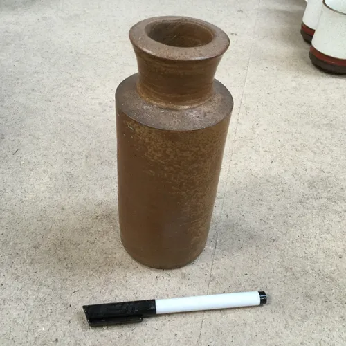 Various Dark Brown Stoneware Bottles