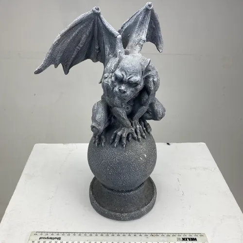 Grey gargoyle sculptures on Sphere 